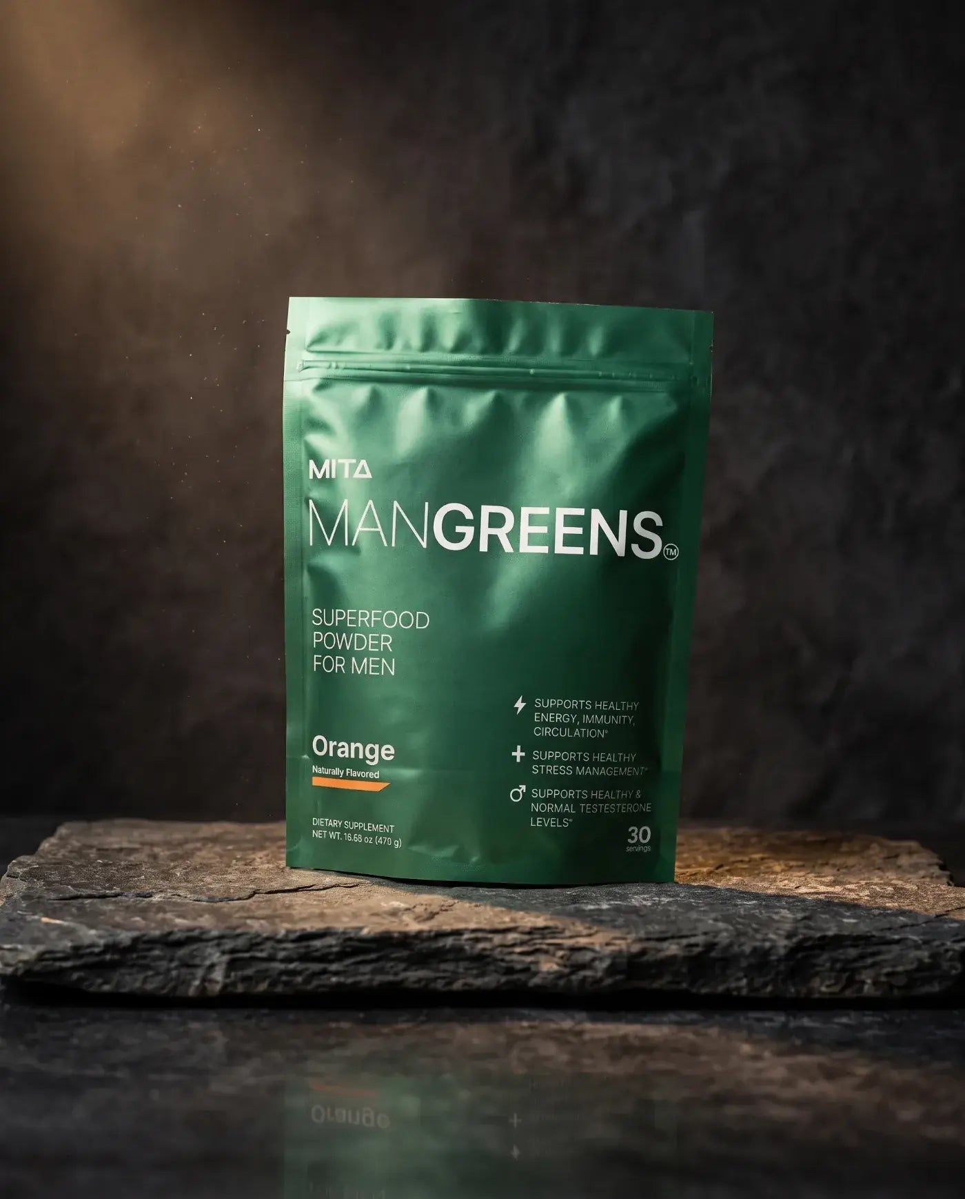 One bag of Man Greens on a stone slab